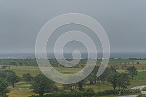 Foggy landscape near Baltic sea in Swedish island Gotland. Photo of scandinavian nature.