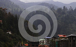 foggy and misty lachung hill station, a popular tourist destination in north sikkim