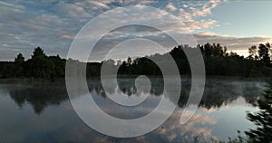 Foggy morning at latvian lake