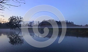 Foggy morning over Wieprza river in Poland