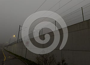 Foggy night on the streets of the Wabern suburb of the capital city of Bern photo