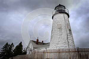 Foggy Pemaquid Point Lighthouse and Keepers House From Below Fence