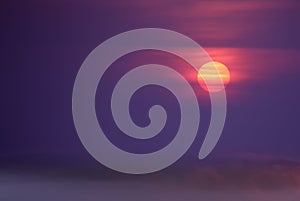 Foggy purple sunset or sunrise background