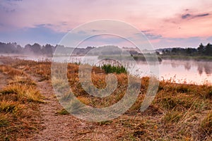 Foggy river in the morning. Misty dawn at summer. Misty morning