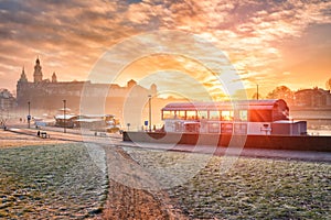 Krakow city park, sunrise, riverside and Wawel royal castle, Poland