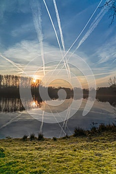 Foggy sunrise over lake