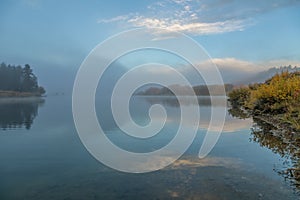 Foggy Sunrise Reflection