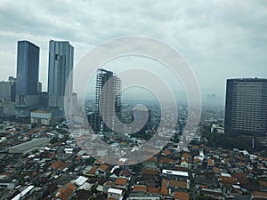 Foggy Surabaya city photo
