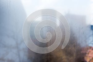 Foggy Window with condensate or steam photo