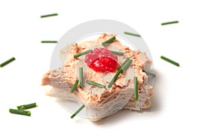 foie gras on bread in shaped star on white background