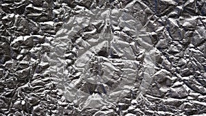 Foil silver crumpled metal aluminum texture background surface decoration backdrop design photo hi-resolution