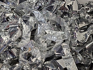 Foil tinsel. Silver foil sequins. Festive background