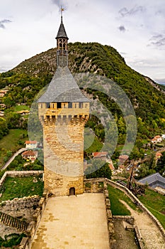 Middle Age Castle tower at Foix in Pyrenees photo