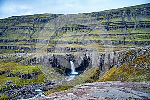 Folaldafoss waterfall and rocky mounatin Iceland