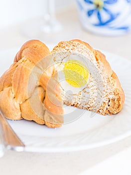 Folar, a traditional Portuguese Easter bread with a whole egg inside