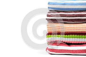 Fold striped clothes, tidiness, organizing concept