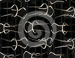 Foldback clips on dark background