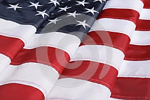 Folded American flag as background, closeup. National symbol