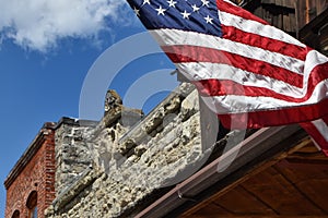 Folded American Flag off a Building