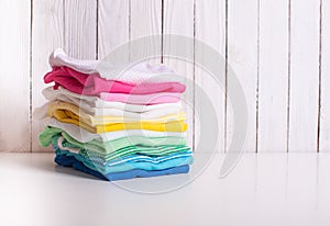 Folded baby clothes