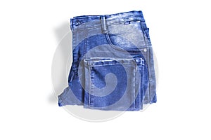 folded blue jeans pants isolated white background