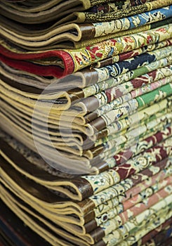 Folded carpets.