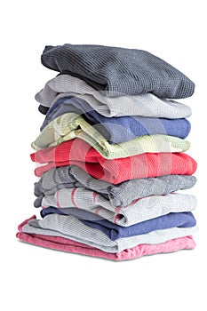 Folded Clean Clothes in a Pile on White Background photo