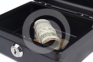 Folded dollars in cash desk