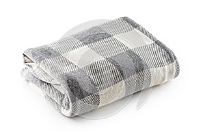 Folded grey and white checkered blanked on an isolated white background