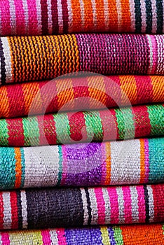 Folded hand woven Peruvian fabrics