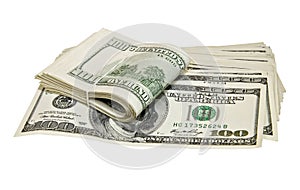 Folded hundred dollar bills isolated on white