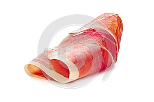 Folded jamon of ham slice on white