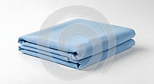 Folded Light Blue Fabric on White Background