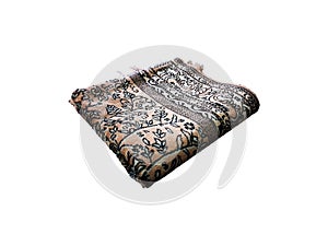 Folded Muslim prayer mat used to pray
