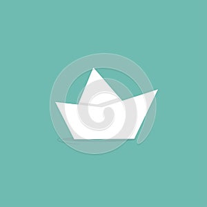 Folded paper boat isolated on turquoise with word ahoy. Powder blue background