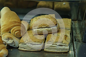 Folded pastries being sold in store photo