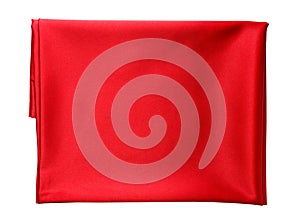 Folded piece of bright red satin fabric isolated on white background, top view