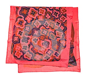Folded red silk scarf with abstract pattern photo