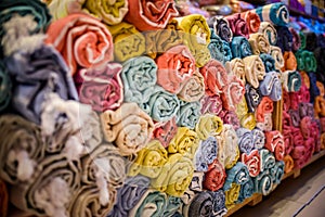 Folded rolls of towels bed linen Galata Turkish Bazaar fabric