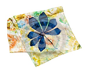 Folded scarf with hand-drawn blue chestnut leaf photo