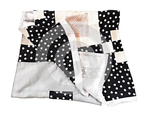 Folded silk scarf sewn from polka dots fabrics