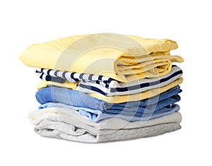 Folded stack clothes isolated on white.