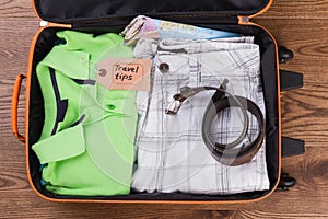 Folded summer apparel and belt.