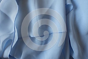 Folded thin light blue chiffon fabric