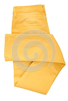 Folded yellow jeans