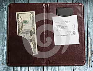 Folder with bill and money