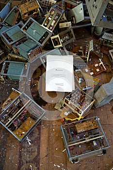 Folder for documents on the background of parts of old electronic devices.