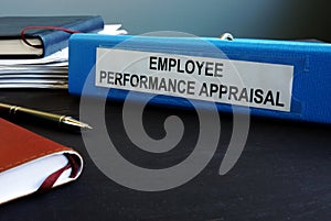 Folder with employee performance appraisal.