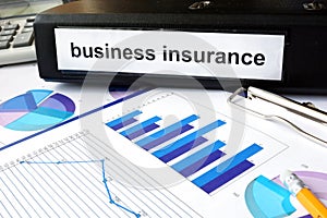 Folder with the label business insurance