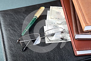 Folder organizers glasses a pen and money